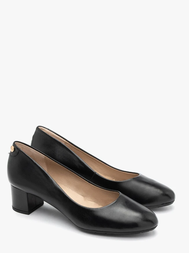 Schwarze niedrige Stiletto-Pumps