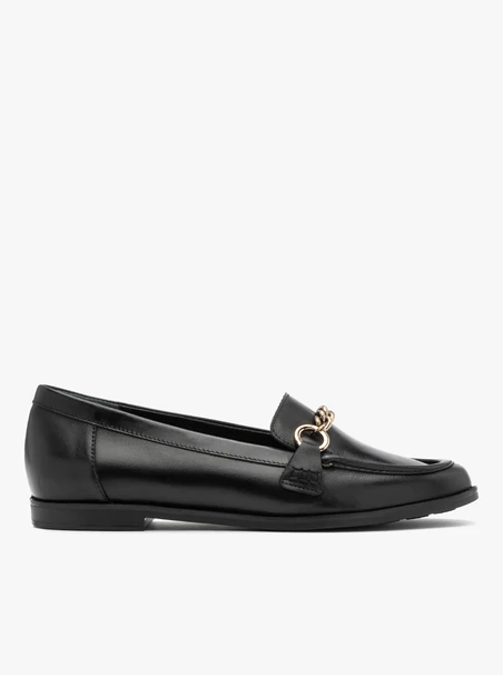 Black flat loafers with gold ornament