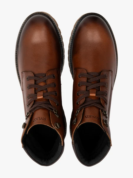 Braune Herrenstiefel mit beiger Sohle