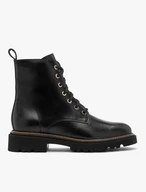 Black women’s boots with gold eyelets