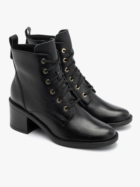 Black women’s lace-up boots with gold eyelets
