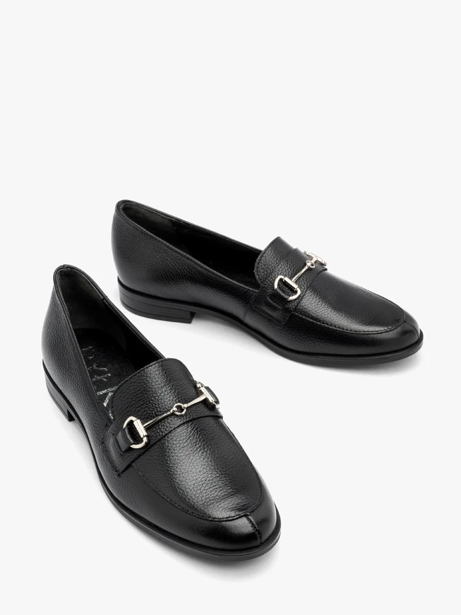 Black loafers with silver ornament
