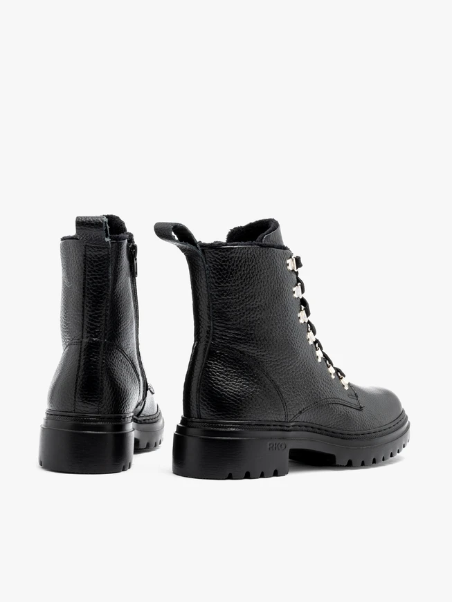 Black women’s boots with decorative hooks