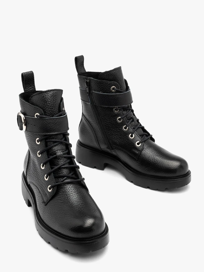 Black women’s boots with decorative buckle