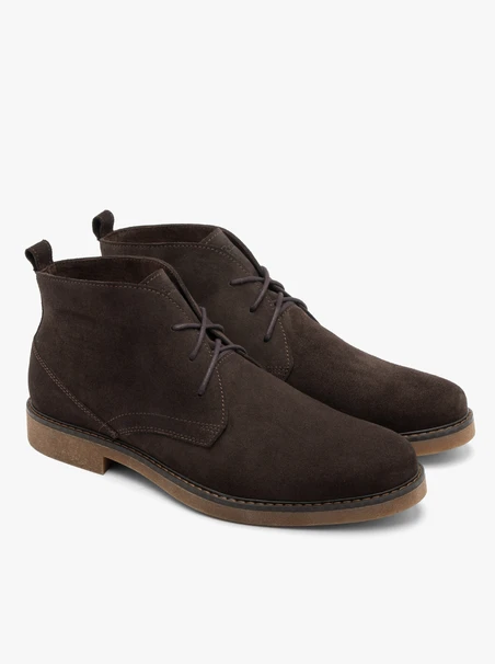 Brown men’s boots with beige sole