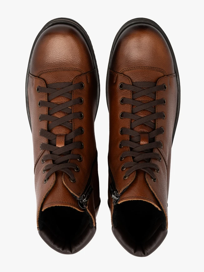 Brown men’s boots with beige-welted sole