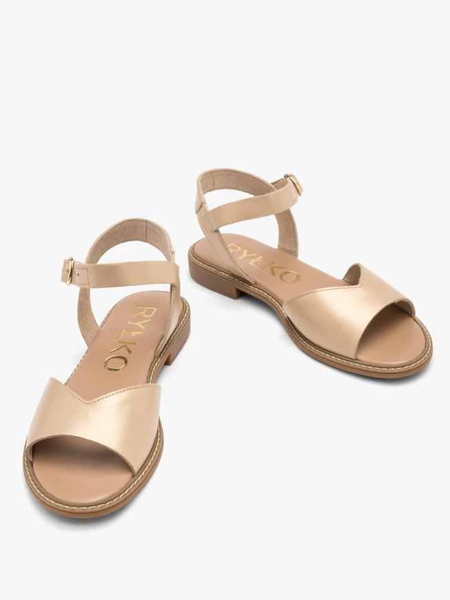 Gold sandal with decorative upper