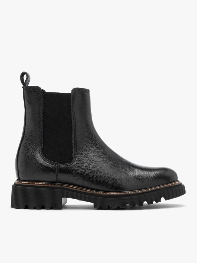 Black Chelsea boots with lug sole and contrast welt
