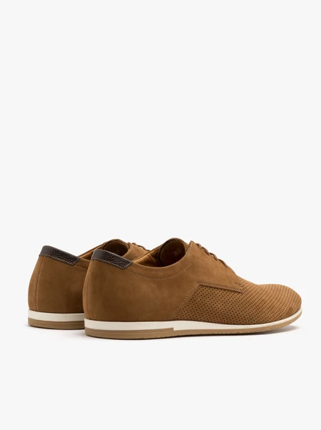 Brown men’s shoes with decorative perforation