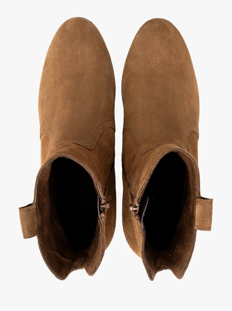 Rust suede ankle boots on a low heel