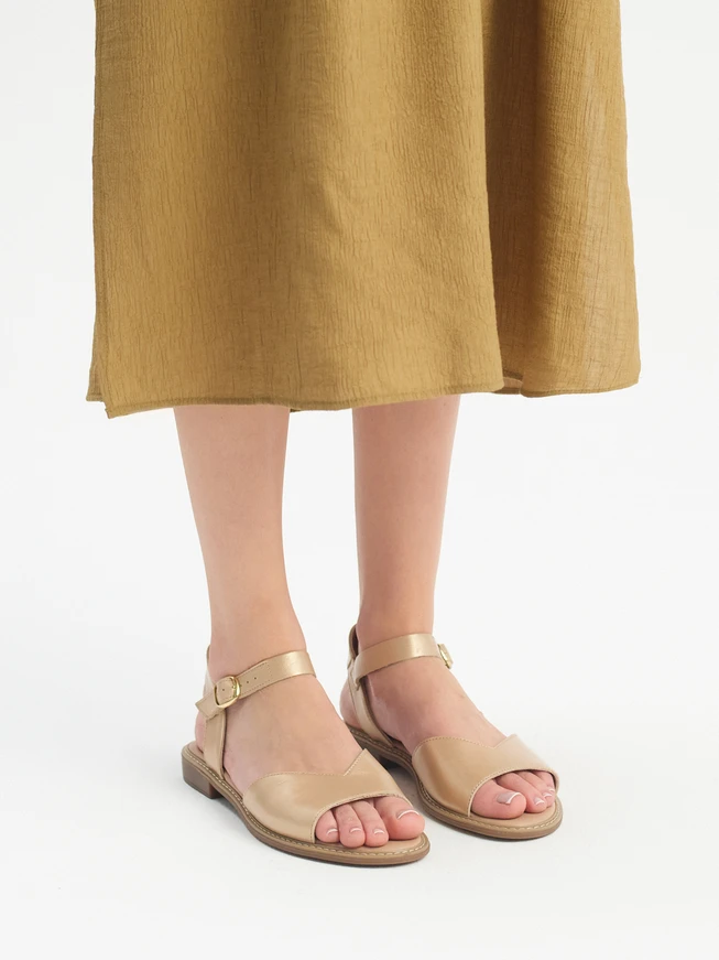 Gold sandal with decorative upper