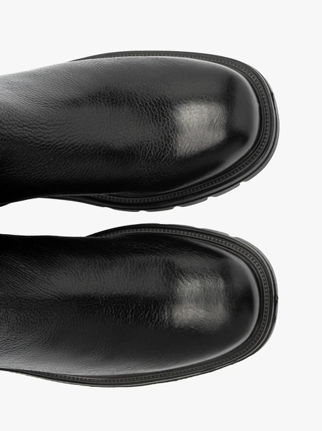 Black stretch knee boots with chunky sole