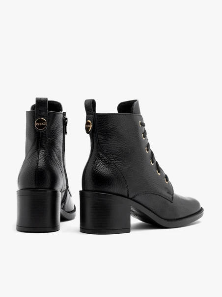 Black women’s lace-up boots with gold eyelets