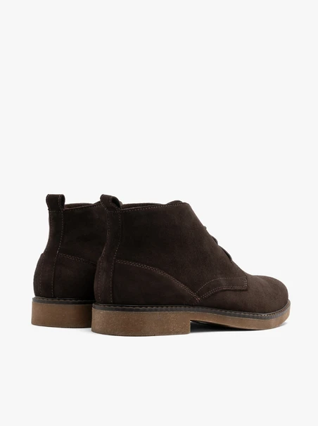 Brown men’s boots with beige sole