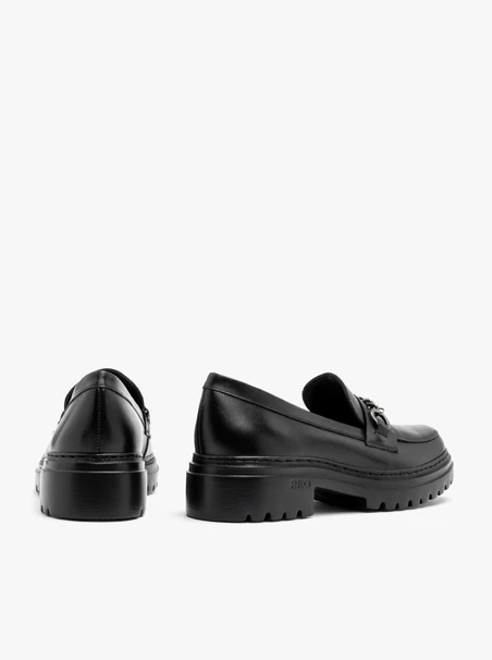 Black loafers with chain on the upper