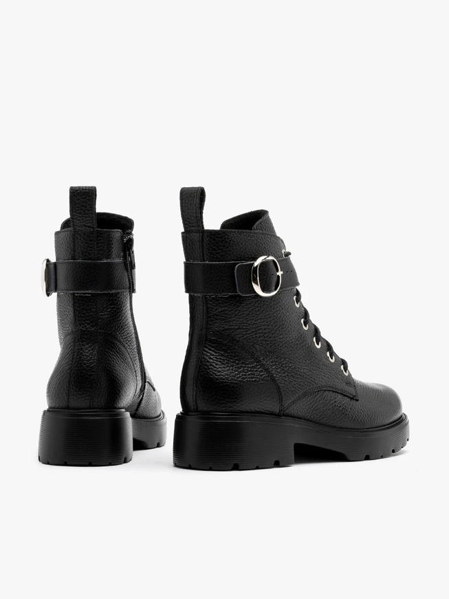 Black women’s boots with decorative buckle