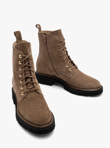 Beige women’s suede ankle boots