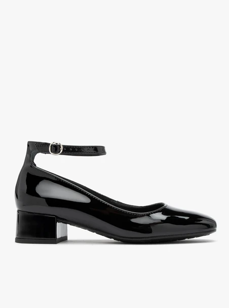 Patent pumps with ankle strap