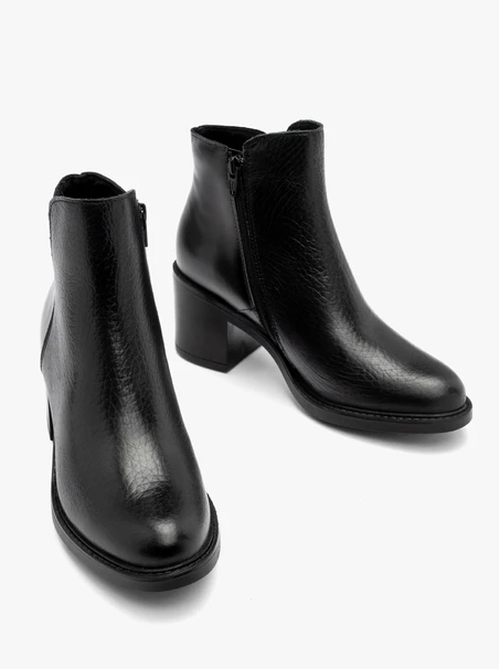 Black ankle boots with mixed-leather detailing