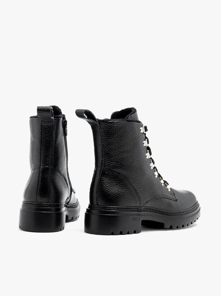 Black women’s boots with decorative hooks