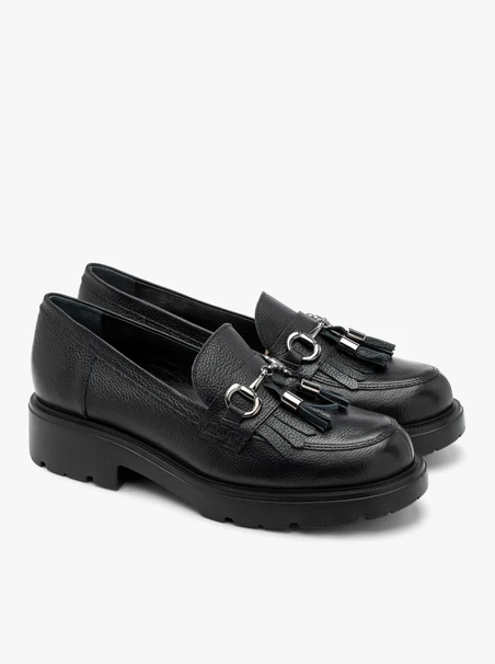 Black loafers with tassels