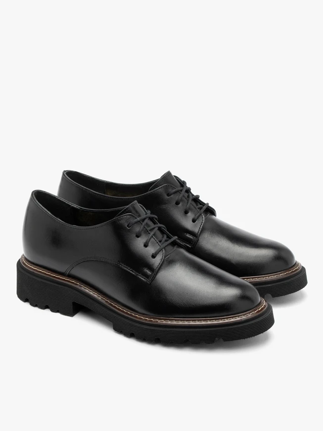 Schwarze Damenhalbschuhe mit dekorativem Boden