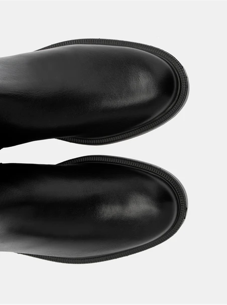 Women’s boots made of mixed materials