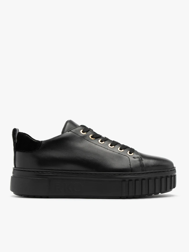 Black sporty shoes with gold details and thick sole