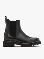 Black Chelsea boots with lug sole and contrast welt