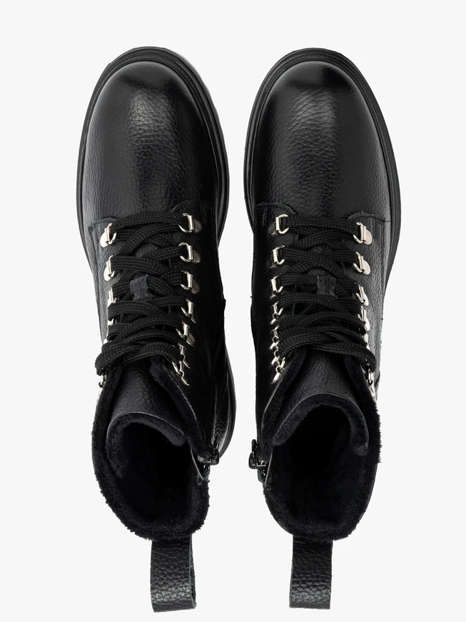 Black women’s boots with decorative hooks