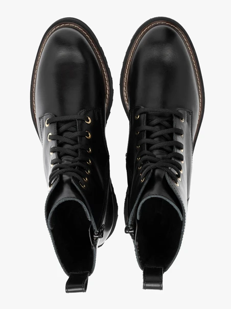 Black women’s boots with gold eyelets