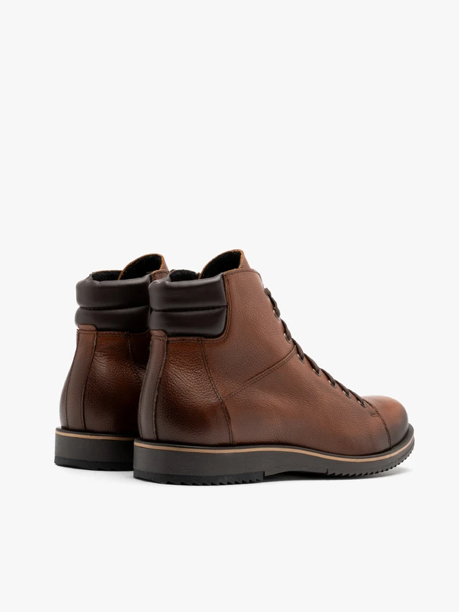 Brown men’s boots with beige-welted sole