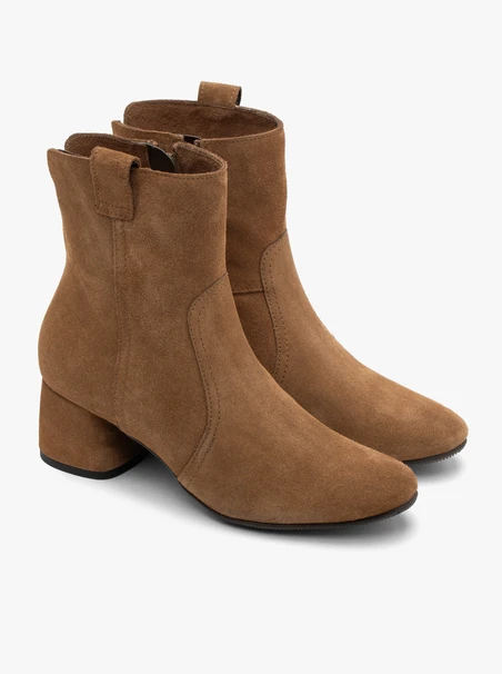 Rust suede ankle boots on a low heel