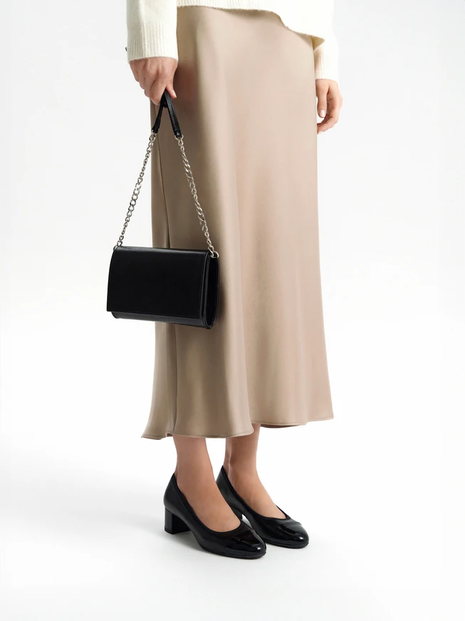 Kleine schwarze Clutch-Tasche