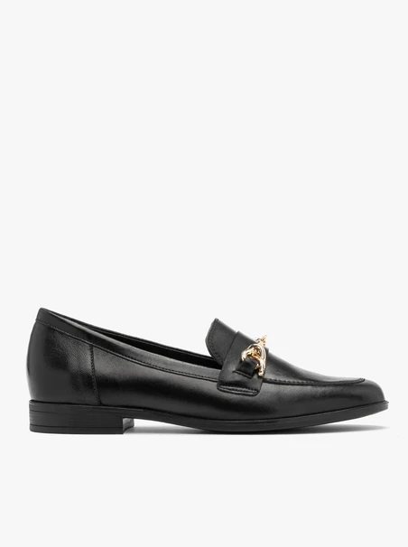 Black loafers with gold ornament