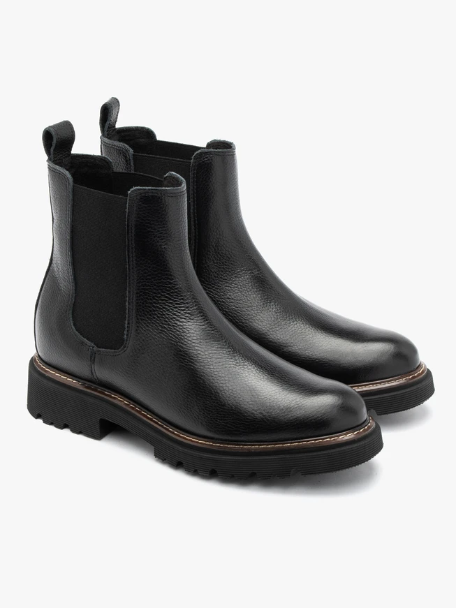 Black Chelsea boots with lug sole and contrast welt