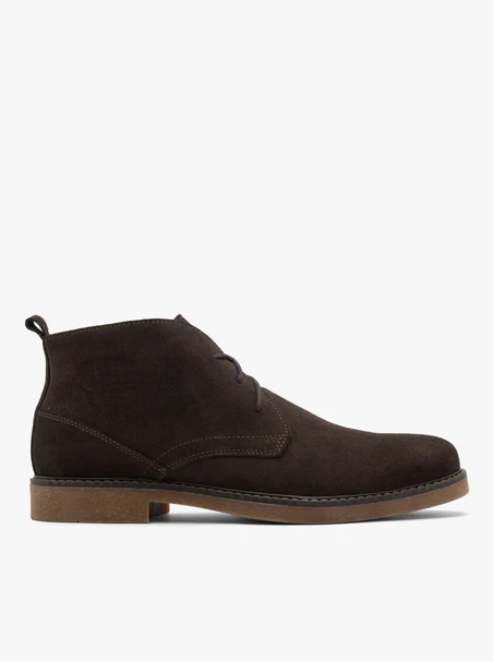 Brown men’s boots with beige sole