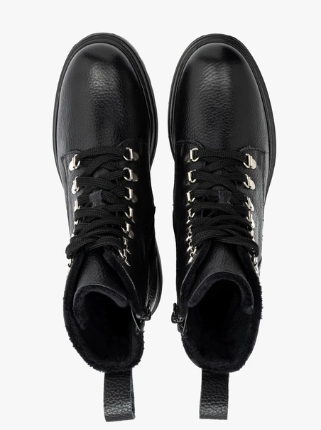 Black women’s boots with decorative hooks