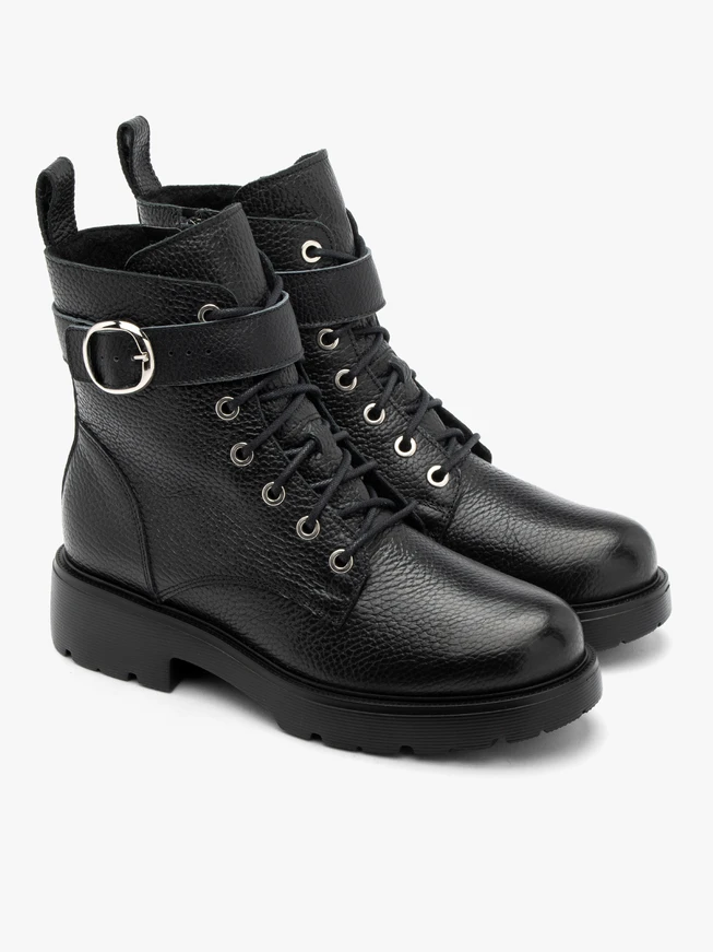 Black women’s boots with decorative buckle
