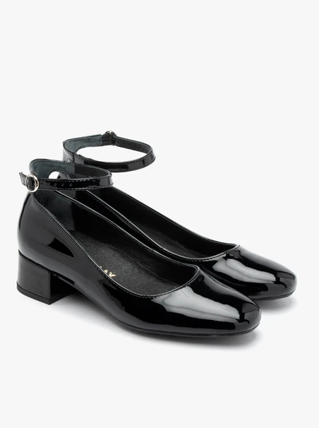 Patent pumps with ankle strap