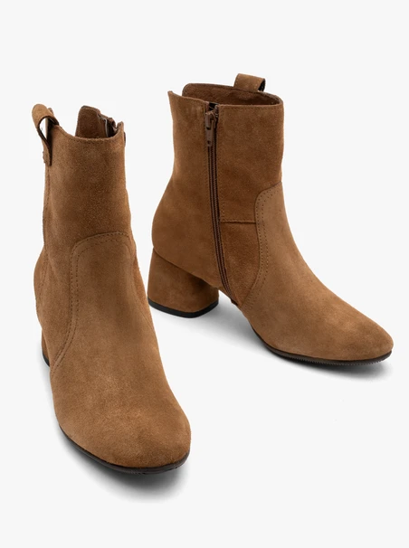 Rust suede ankle boots on a low heel