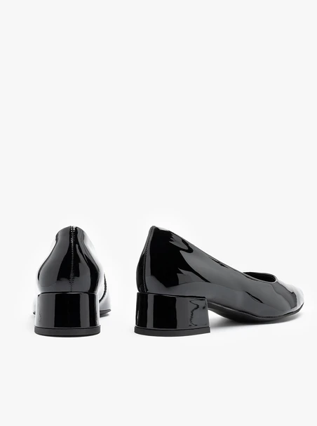 Black patent low-heel pumps