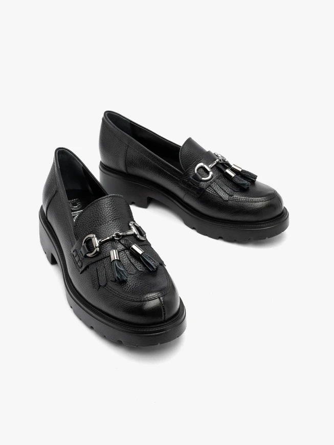 Black loafers with tassels