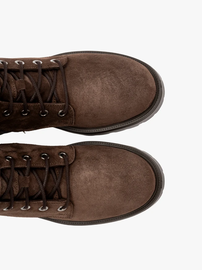 Brown women’s boots with decorative buckle