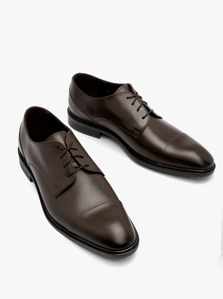 Dark brown shoes with decorative toe