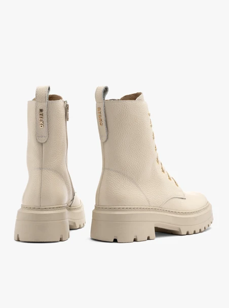 Cremefarbene Damenstiefel mit festem Boden