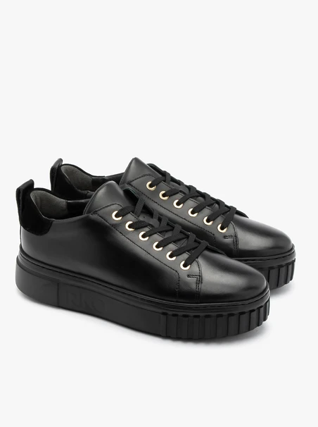 Black sporty shoes with gold details and thick sole
