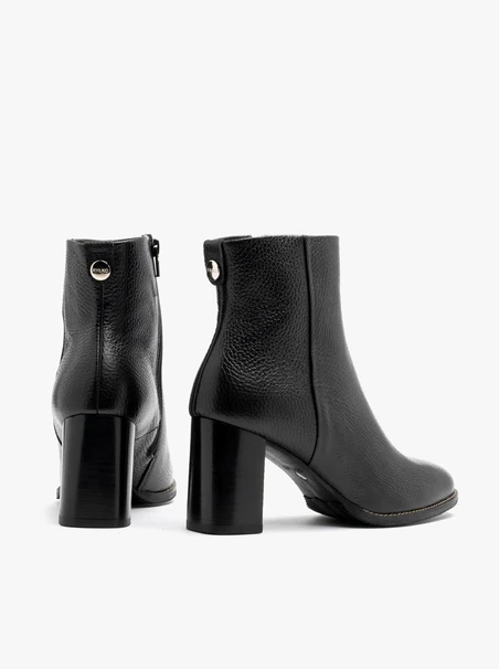 Black block-heel women’s ankle boots with leather paneling