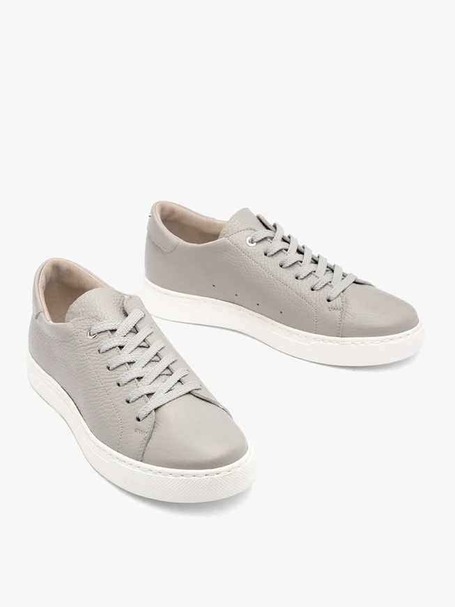 Gray sporty shoes with lightweight white sole
