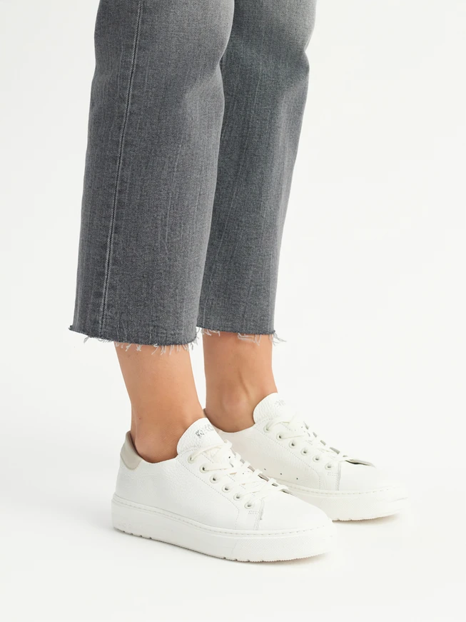 White sporty shoes with lightweight sole